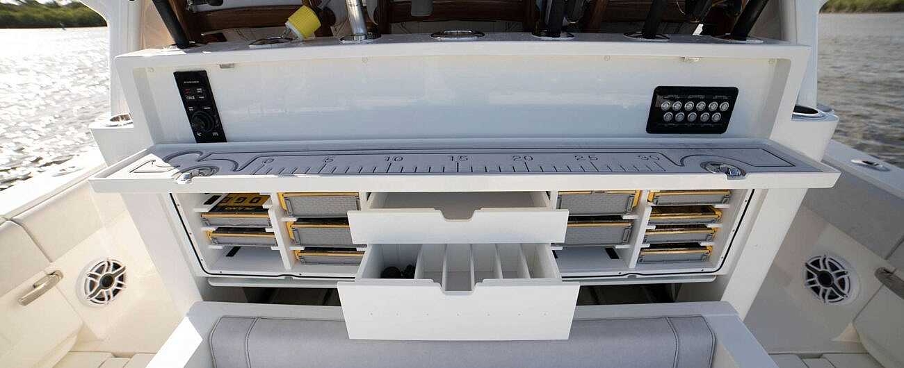 Integrated Tackle Station: Plenty of tackle storage, a rigging table and optional controls for lighting and electronics.
